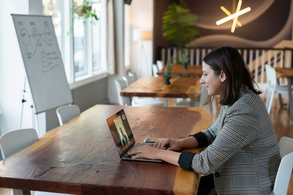 Woman working from home on a Zom call.